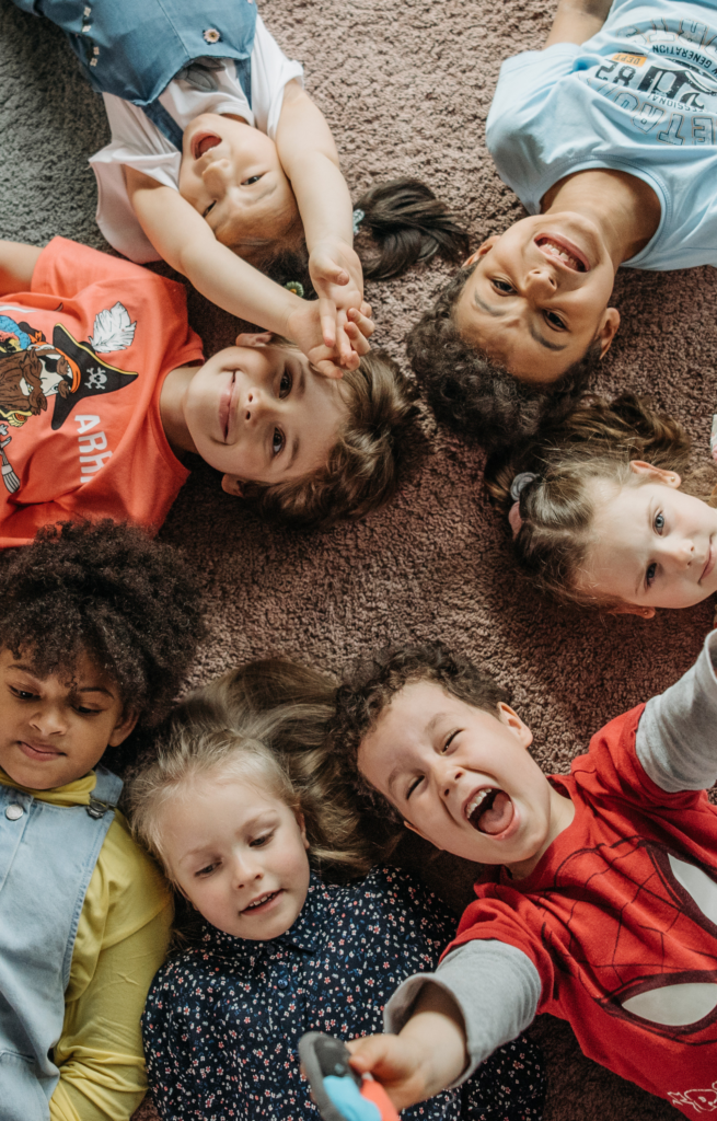 a teddy bear with bandaged head and a mask